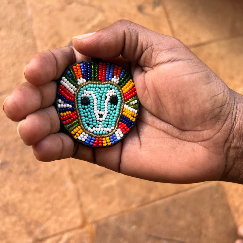 Lion keychain . Colourful Maasai beaded keychain.