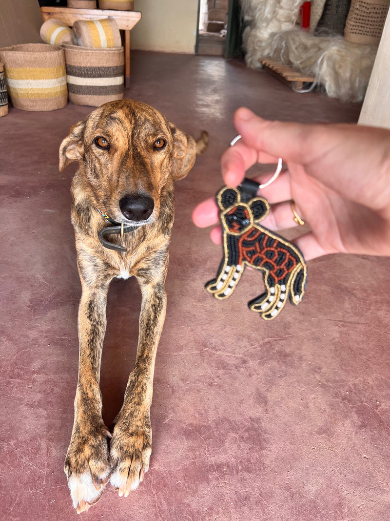 Wild dog keychain . Colourful Maasai beaded keychain.
