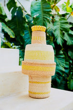 yellow set of 5 baskets . sisal . practical weave . one-of-a-kind .